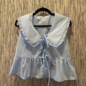 Cute light blue cotton top with bow ties